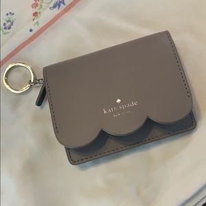 Kate Spade lilac colored key card holder.